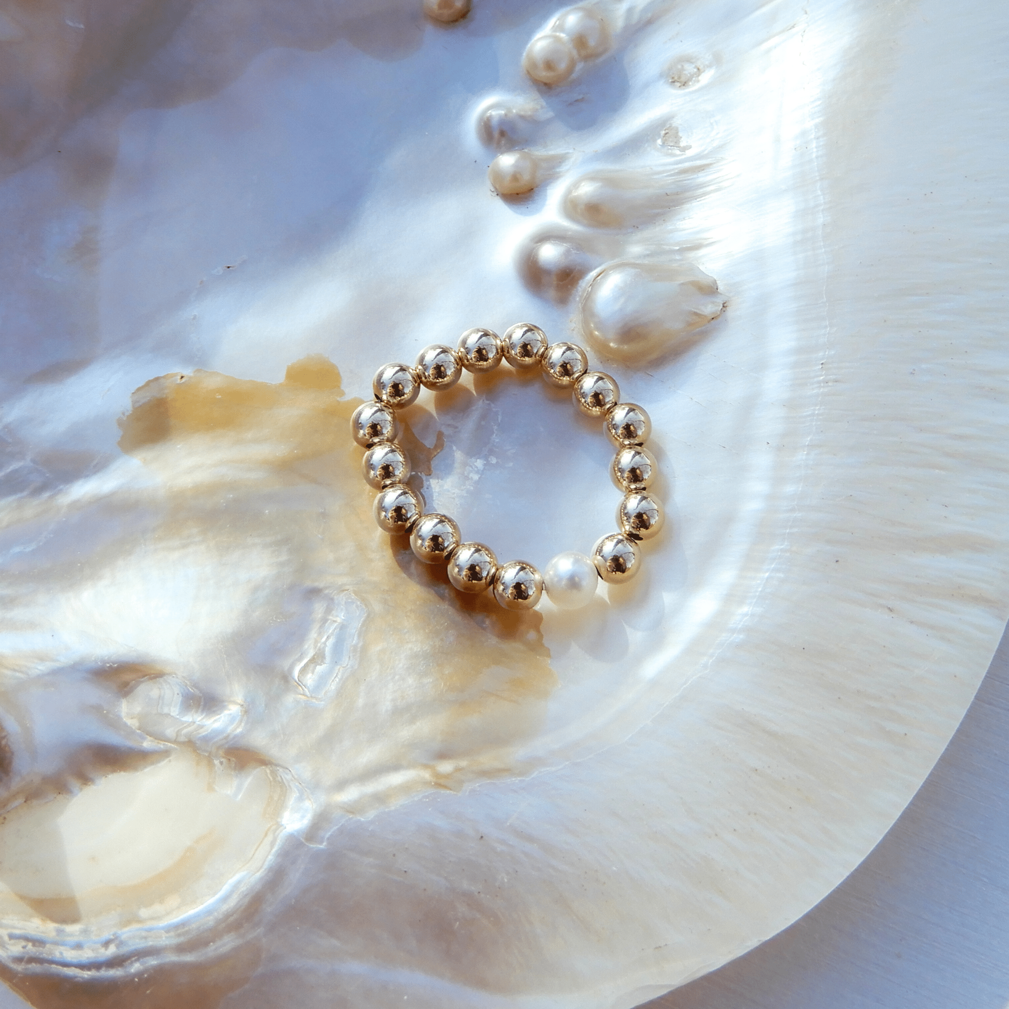 Stretch ring met Parel 4mm - Gloria Maris Giethoorn