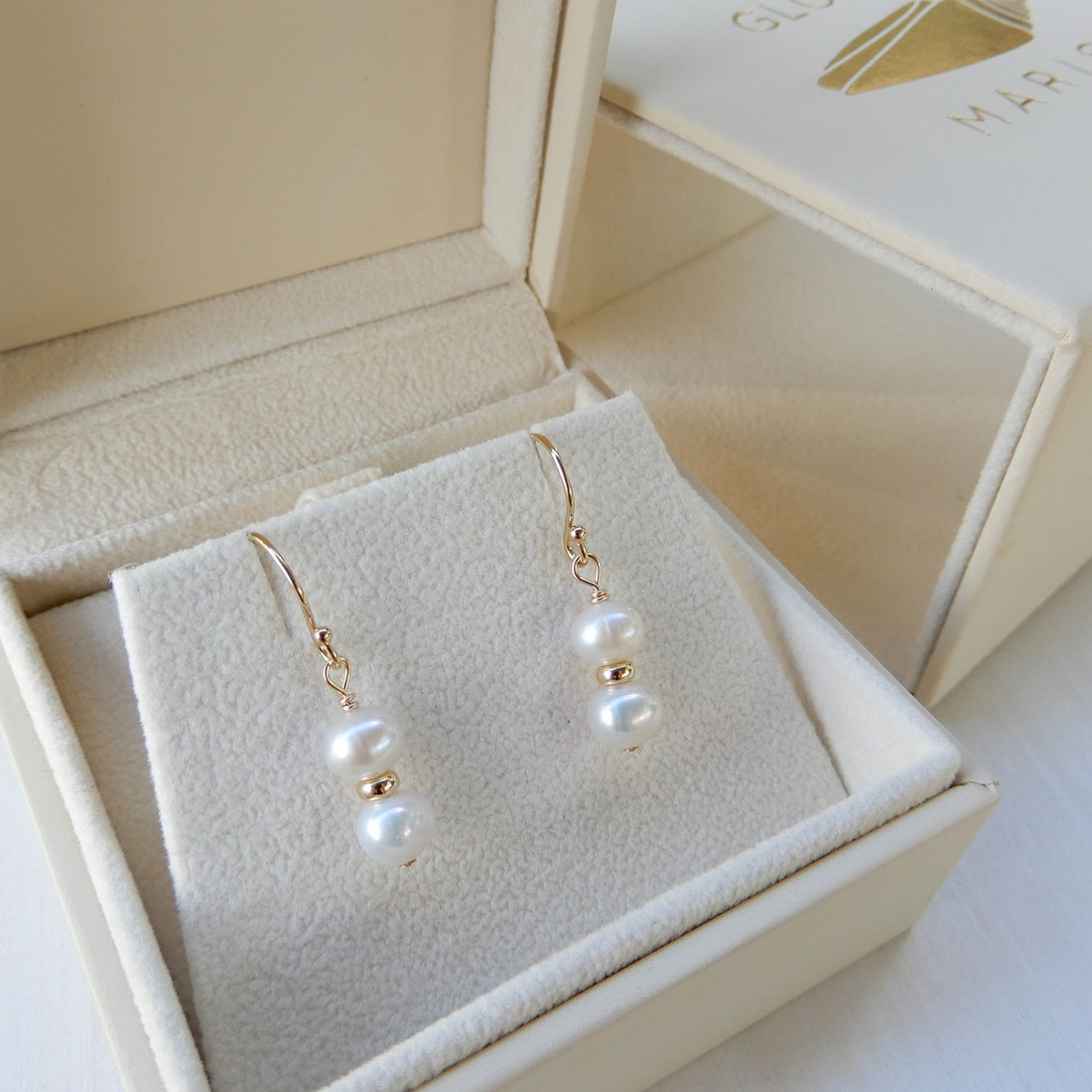 Prachtige zoetwater Parel oorhangers in combinatie met goudkleurige rondel