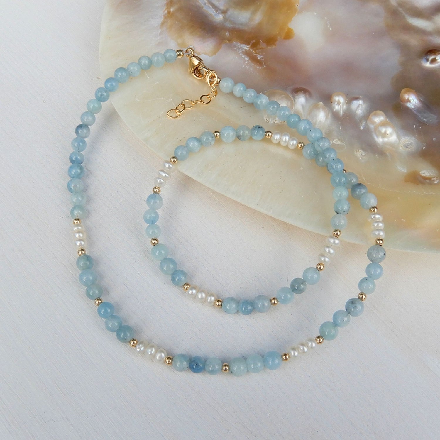 Aquamarijn collier in combinatie met zoetwater Parel. Afgewerkt met gold filled.