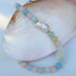 Uniek collier met Beryl en zoetwater Parel.