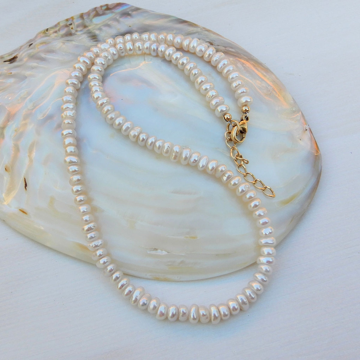 Zoetwater parel collier button.