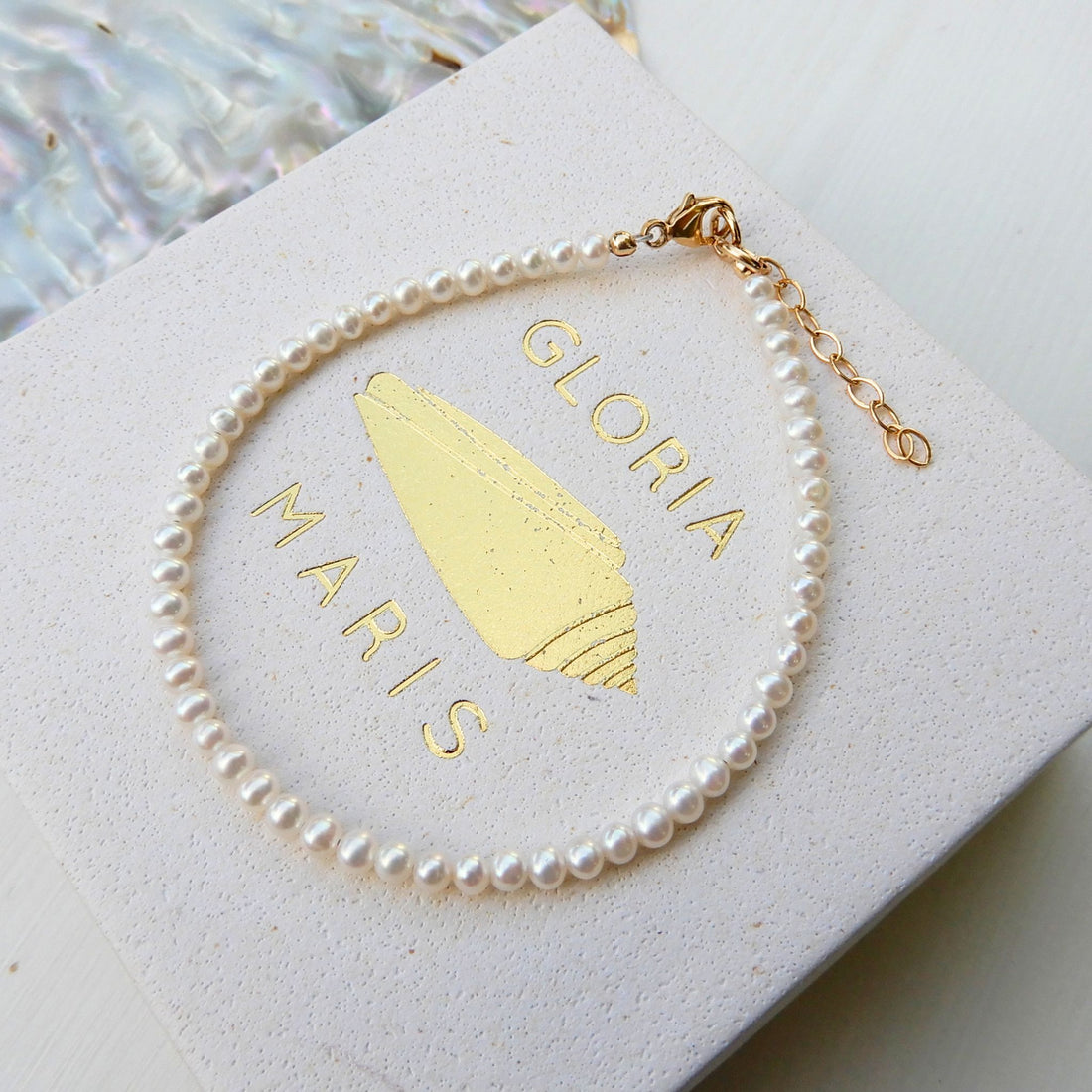 Zoetwater Parel armband van 3-3,5mm ronde Parels, met goudkleurig slot.