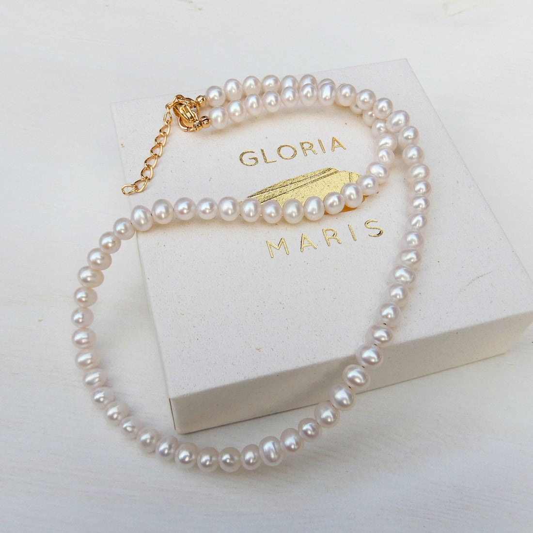 Prachtig zoetwater Parel collier, rond 5-5,5mm met GF slot en verlengketting.