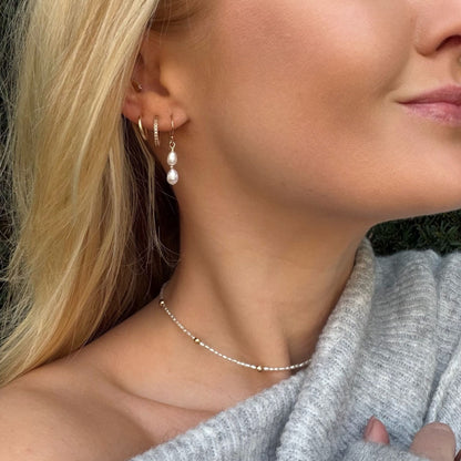 Zoetwater rijst Parels met goudkleurige tussenkraal.